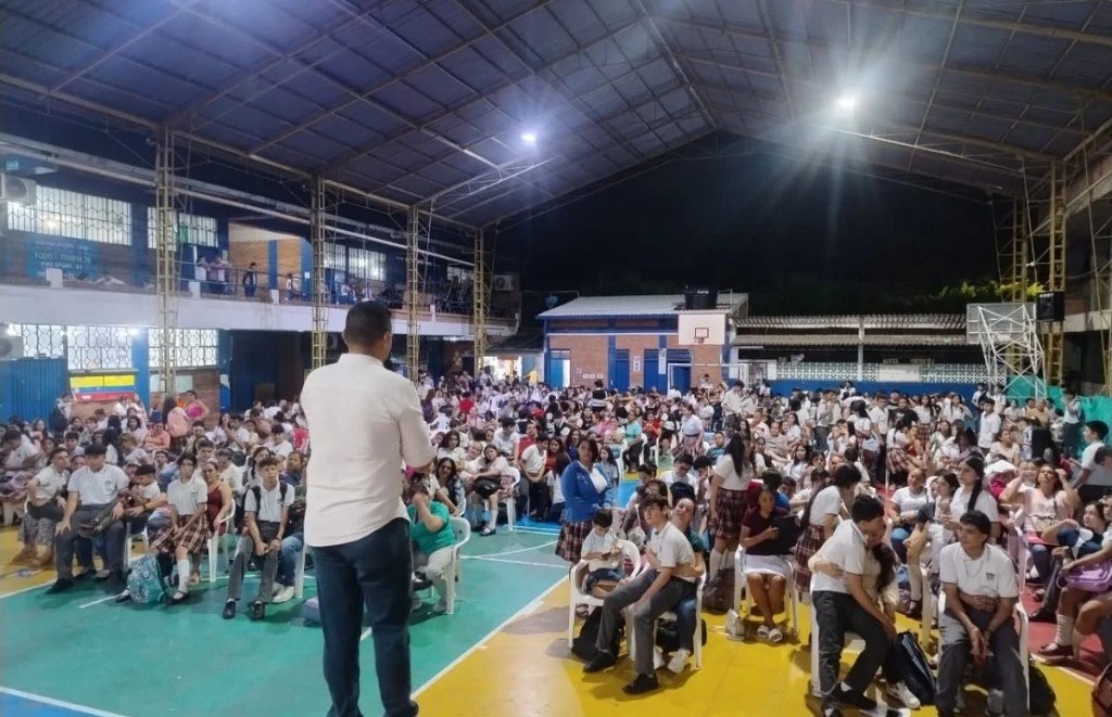 Large school assembly with youth and families